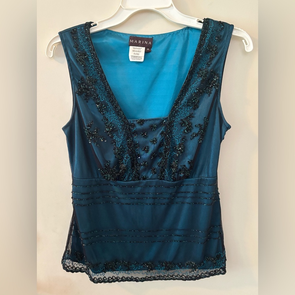 Beaded sleeveless top. Size M